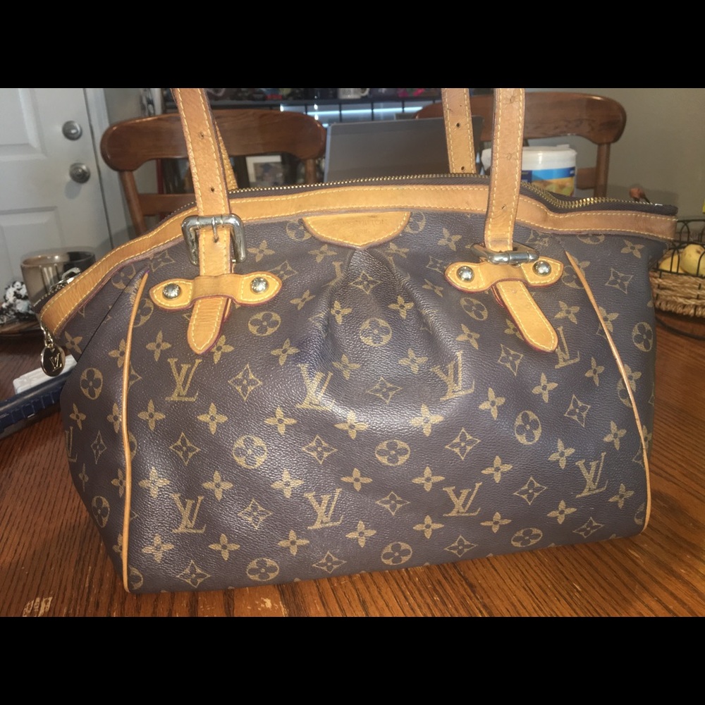 Pre owned lv tivoli gm large purse..